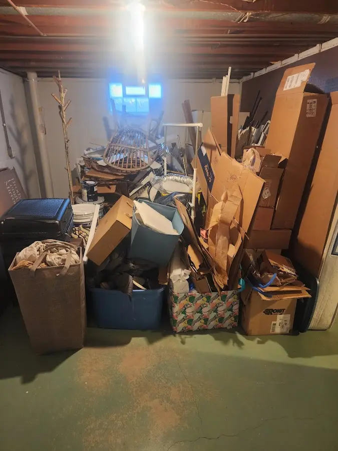 Roll-off dumpster container at job site for Construction Dumpster Rental in Bowdoinham